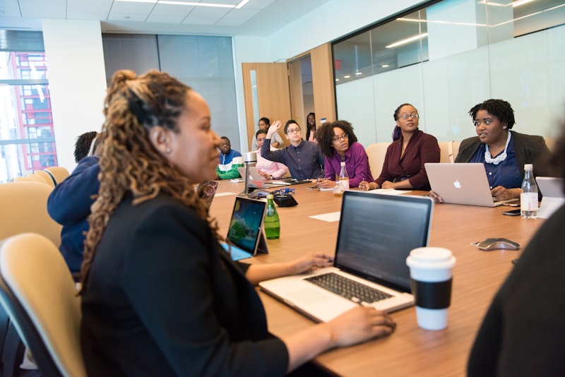 Black woman leading a professional workshop presentation