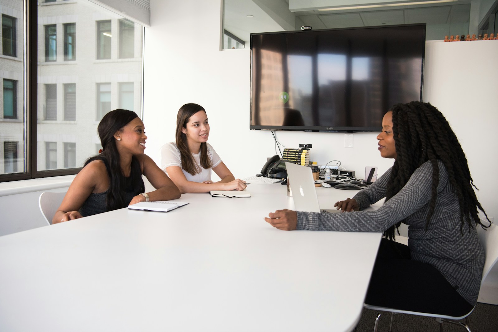Black women professionals planning community-focused action together